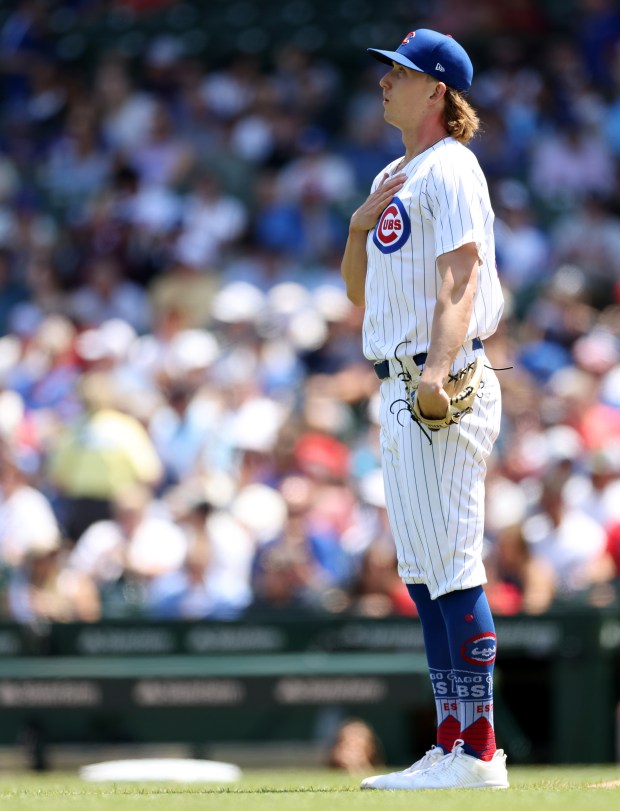 Cubs pitcher Ben Brown looks toward the outfield before taking the mound against the Braves in the first inning on May 23, 2024, at Wrigley Field. (John J. Kim/Chicago Tribune)