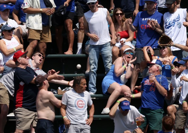 Fans watch a home run ball hit by Braves left fielder Jarred Kelenic land in the right-field bleachers in the fifth inning on May 23, 2024, at Wrigley Field. (John J. Kim/Chicago Tribune)