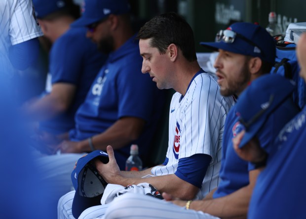 Cubs pitcher Kyle Hendricks sits in the dugout in the eighth inning on May 23, 2024, at Wrigley Field. (John J. Kim/Chicago Tribune)