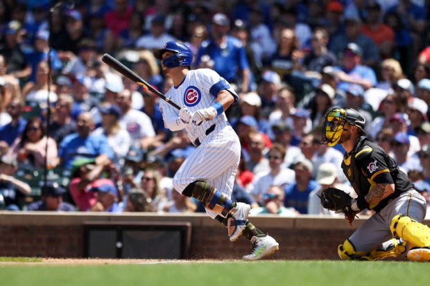 Chicago Cubs outfielder Seiya Suzuki hits a sacrifice fly during the third inning against the Pittsburgh Pirates at Wrigley Field on May 19, 2024. (Eileen T. Meslar/Chicago Tribune)