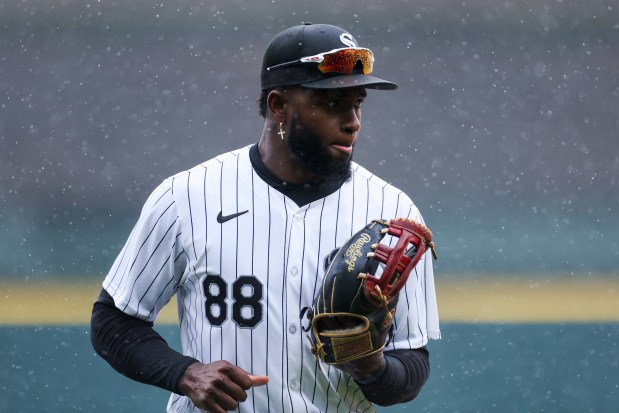 White Sox center fielder Luis Robert Jr. runs to the dugout during a game against the Braves on April 1, 2024, at Guaranteed Rate Field. (Eileen T. Meslar/Chicago Tribune)