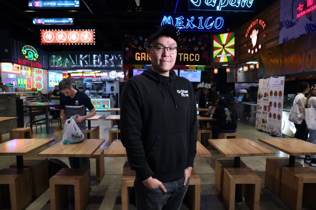 Kenny Yang, owner of Gangnam Food Hall and Gangnam Market, the attached grocery store, is seen at the food hall at 1001 W. Chicago Ave. in Chicago on April 30, 2024. (Terrence Antonio James/Chicago Tribune)