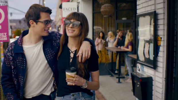 An L.A. gallery owner (Anne Hathaway, right) embarks on an affair with a boy-band favorite (Nicholas Galitzine) in "The Idea of You." (Prime Video)