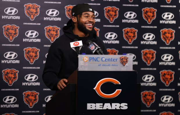 Chicago Bears running back D'Andre Swift (4) answers questions from the media following Organized Team Activities at Halas Hall in Lake Forest on Friday, May 31, 2024. (Chris Sweda/Chicago Tribune)