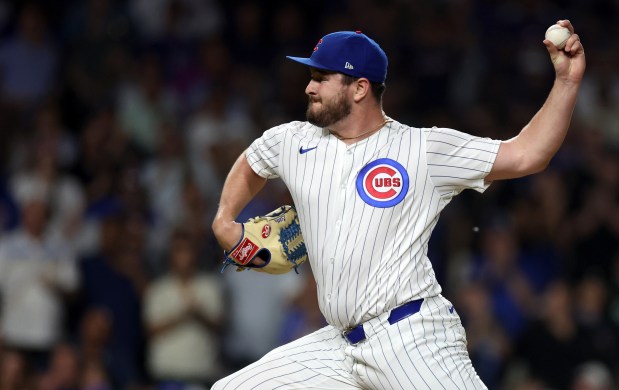 Chicago Cubs relief pitcher Luke Little (43) delivers to the Atlanta Braves in the 10th inning of a game at Wrigley Field in Chicago on May 21, 2024. (Chris Sweda/Chicago Tribune)