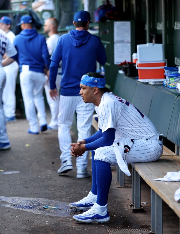 Cubs reliever Adbert Alzolay sits in the dugout after being pulled in the eighth inning against the Brewers on Friday, May 3, 2024, at Wrigley Field. (Chris Sweda/Chicago Tribune)