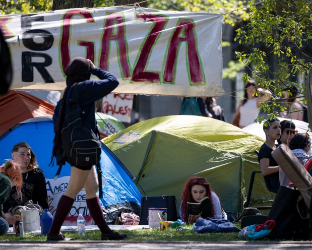 University of Chicago students and community members gather at an encampment on campus on May 1, 2024, in support of Gaza and the Palestinian people. (Brian Cassella/Chicago Tribune)