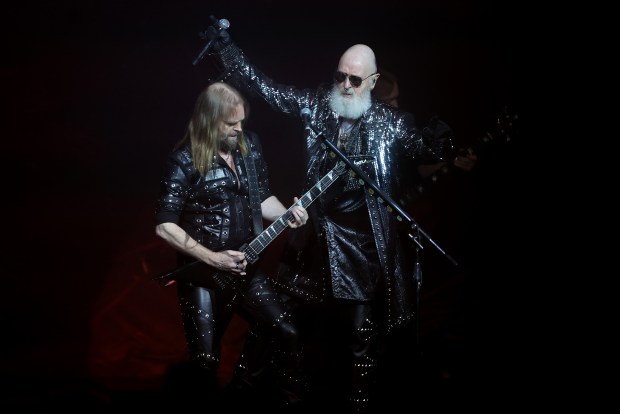 Vocalist Rob Halford (right) performs with guitarist Andy Sneap as Judas Priest plays the Rosemont Theatre on May 1, 2024. (Chris Sweda/Chicago Tribune)