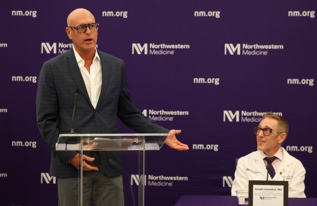 Brad Szczecinski, a kidney transplant patient, speaks about Dr. Joseph Leventhal, director of the Living Donor Kidney Transplant Program at Northwestern Medicine, during a news conference on May 15, 2024, commemorating Northwestern becoming the first health system in Illinois to complete 10,000 abdominal organ transplant procedures. (Eileen T. Meslar/Chicago Tribune)