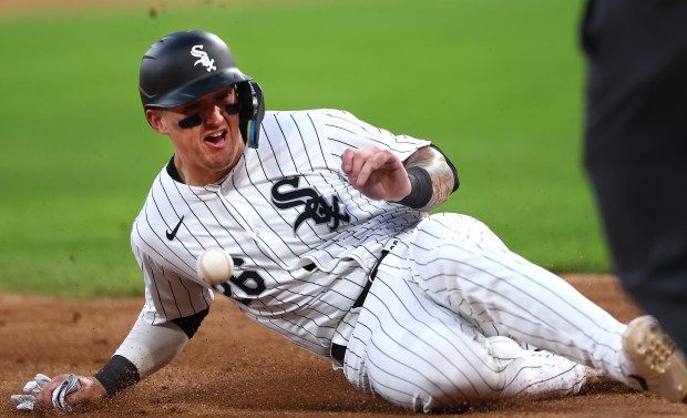 White Sox catcher Korey Lee slides safely into third base in the fifth inning against the Guardians on May 10, 2024, at Guaranteed Rate Field. (Chris Sweda/Chicago Tribune)