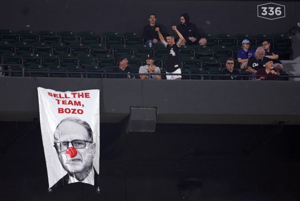 A sign depicting White Sox Chairman Jerry Reinsdorf as a clown is seen hanging in the 300 level of Guaranteed Rate Field during a game against the Orioles on May 23, 2024. (Chris Sweda/Chicago Tribune)