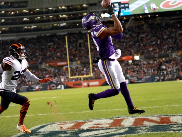 Bears safety Deon Bush is unable to stop Vikings wide receiver Justin Jefferson from catching a touchdown pass in the first quarter at Soldier Field on Dec. 20, 2021. (Chris Sweda/Chicago Tribune)
