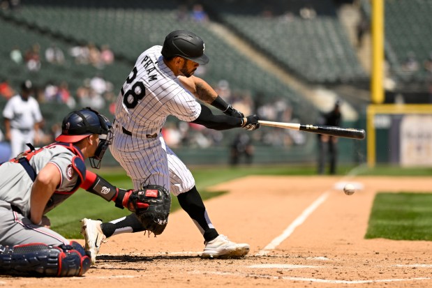 White Sox outfielder Tommy Pham hits an RBI double in the third inning against the Nationals on May 15, 2024, at Guaranteed Rate Field. (Quinn Harris/Getty)