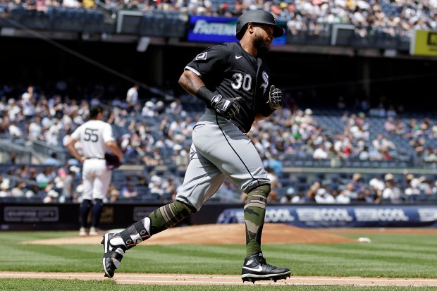 Chicago White Sox's Corey Julks (30) rounds the bases after hitting a home run off of New York Yankees pitcher Carlos Rodón (55) during the second inning of a baseball game Sunday, May 19, 2024, in New York. (AP Photo/Adam Hunger)