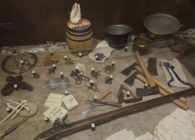 The Elgin Public Museum of Natural History and Anthropology has about a thousand items in its Native American collection, including these items being used in an exhibit that's been recently redone to better reflect the indigenous experience when European settlers arrived. (Gloria Casas/The Courier-News)