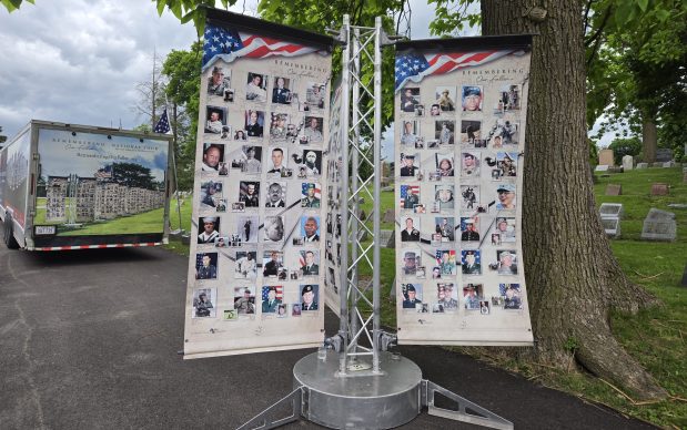 Remembering Our Fallen is a photographic exhibit created by Patriotic Productions to remember more than 5,000 members of the military killed in action since 9/11. It will be on display at Elgin's Bluff City Cemetery through Memorial Day weekend. (Gloria Casas/The Courier-News)