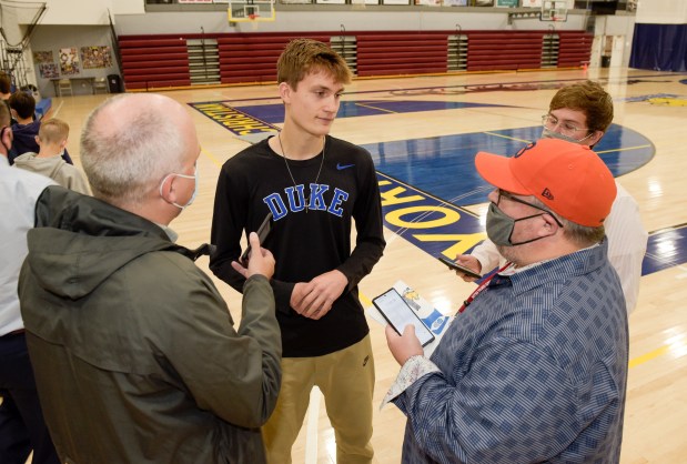 Yorkville Christian boys basketball standout Jaden Schutt talks with the media after signing with Duke on Wednesday, Nov. 10, 2021.