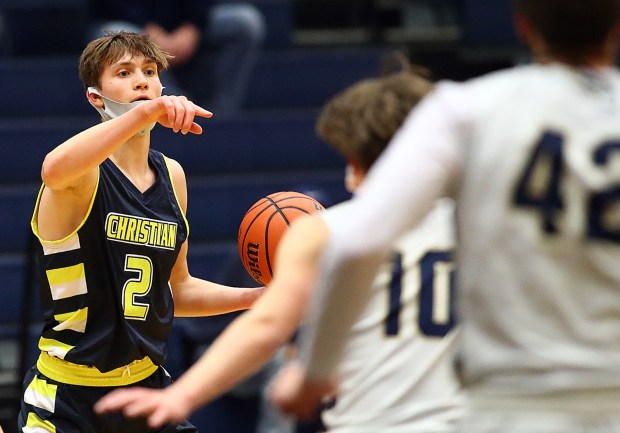 Yorkville Christian's Jaden Schutt (2) sets up a play against Harvest Christian during a nonconference game in Elgin on Friday, Feb. 26, 2021.