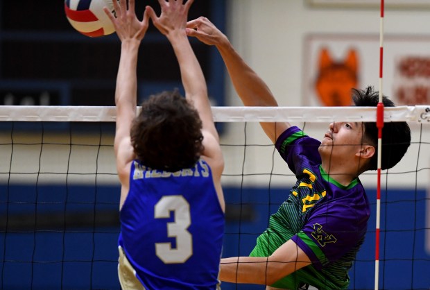 Waukegan's Landon Diaz (24) spikes the ball. The 3-22 Wheeling Wildcats hosted 19-9 Waukegan's boys volleyball team for a non-conference matchup, Monday, May 6, 2024.  (Rob Dicker/for Pioneer Press)