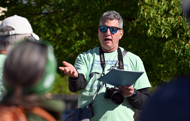 Facing, Steve Greenberg of Highland Park, site captain, addresses volunteers before they disperse for duty at the 32nd annual Chicago River Day cleanup location in Highland Park at The Preserve at Highland Park on May 11, 2024.