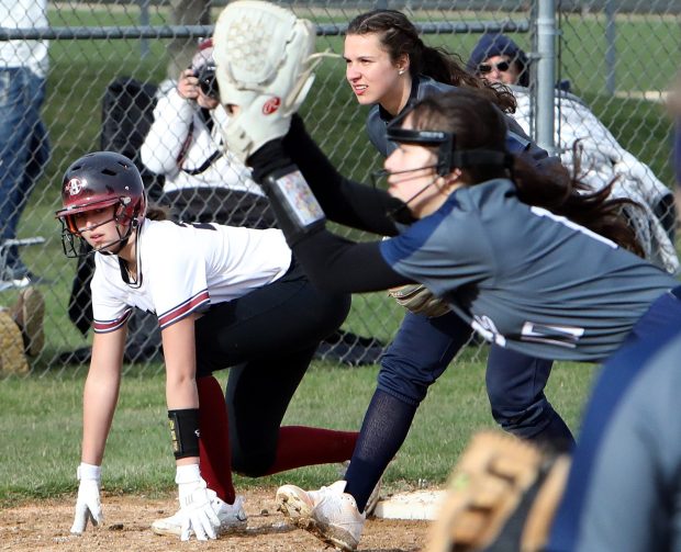 Antioch's Addison Webb waits at 3rd for the pitch during the softball game against Glenbrook South in Glenview, Wednesday, April 5, 2023. (James C. Svehla-News Sun)