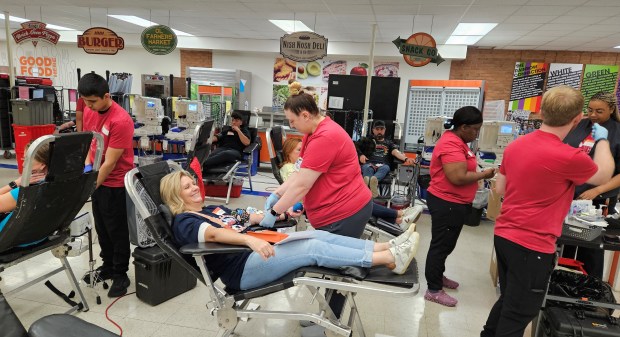 There were 100 beds awaiting donors inside Naperville North High School Saturday for the fifth annual A Pint for Kim blood drive, which organizers hoped would set a new record by bringing in 800 pints of blood. (David Sharos/Naperville Sun)
