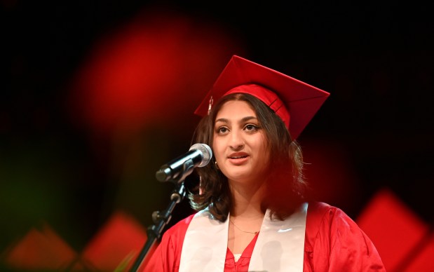 Rowan Patel, senior class president, addresses the audience at the Barrington High School graduation at Willow Creek Community Church in South Barrington on May 23, 2024. (Karie Angell Luc/Pioneer Press)