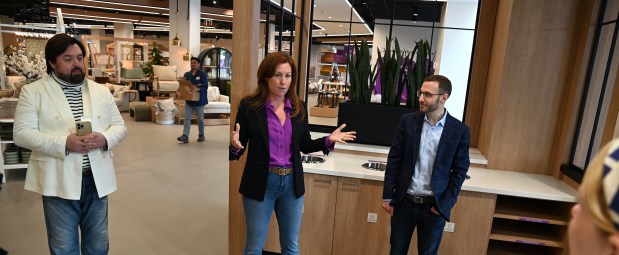 From left to right, Barclay Resler, Wayfair's head of visual merchandising for physical retail, Liza Lefkowski, Wayfair's vice-president, merchandising, brands and stores and Adam Katz, Wayfair's head of physical retail, make an appearance on a media tour of the Wayfair store at Edens Plaza (3232 Lake Ave.) in Wilmette on May 15, 2024. (Karie Angell Luc/Pioneer Press)