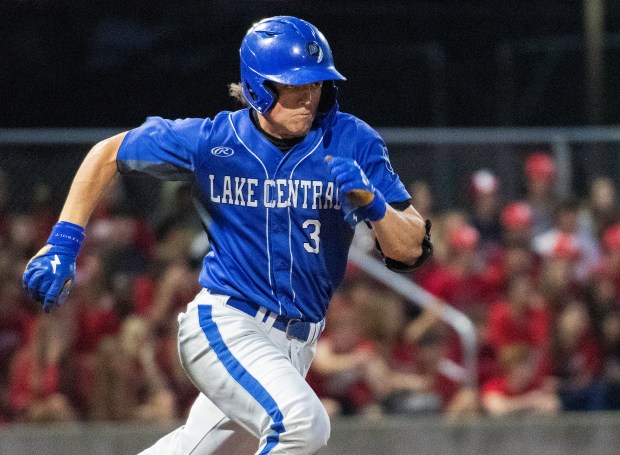 Lake Central's Andrew Arnold runs to first base during a game against Munster in the first round of the Class 4A Munster Sectional on Thursday, May 23, 2024. (Michael Gard/for the Post-Tribune)