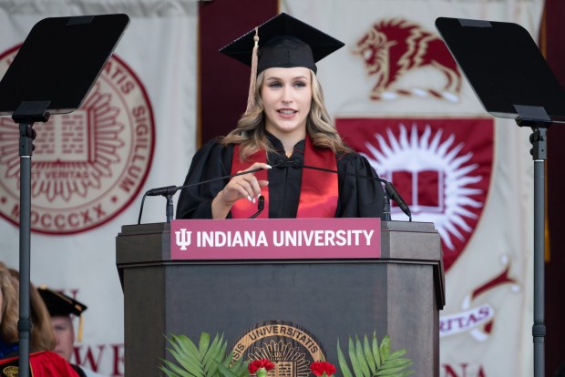 School of Business and Economics graduate Jennifer Dejanovich inducts Class of 2024 students during the Indiana University Northwest commencement ceremony on Wednesday, May 8, 2024. (Kyle Telechan/for the Post-Tribune)