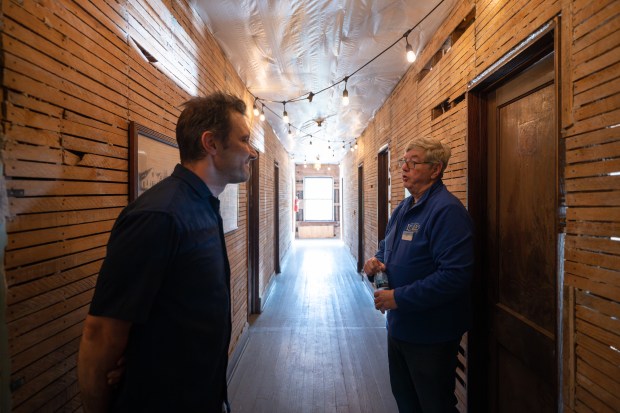 Museum at Lassen's member Mikhail Kostikov, on left, speaks with Museum at Lassen's tour guide Jack Pruzin during a season opening celebration at the facility in Cedar Lake on Friday, May 3, 2024. (Kyle Telechan/for the Post-Tribune)