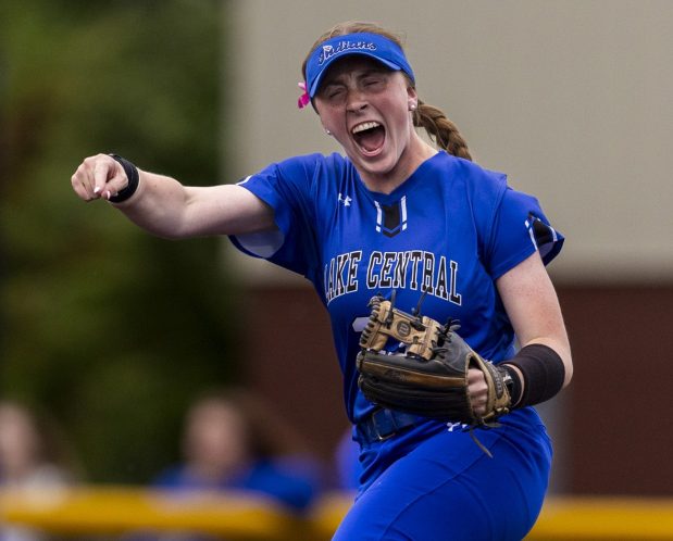 Lake Central's Taylor Schafer shouts and pumps her arms after Sofia Calderaro throws strike three for the second out of the seventh inning against Munster during the Class 4A Lake Central Sectional championship game in St. John on Friday, May 24, 2024. (Vincent D. Johnson/for the Post-Tribune)