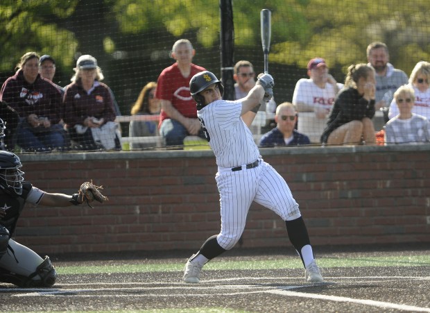 St. Laurence's Matthew Carrano (26) connects for a hit against Brother Rice during a Chicago Catholic League game Monday, May 6, 2024 in Burbank, IL. (Steve Johnston/Daily Southtown)