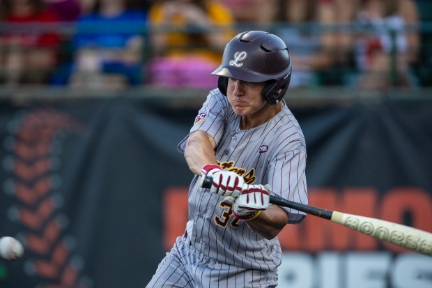 Lockport's Justin VanderTuuk swings at a pitch from Lyons in the Do It Stevie's Way Tournament championship game at Ozinga Field in Crestwood on Saturday, May 18, 2024. (Vincent D. Johnson/for the Daily Southtown)