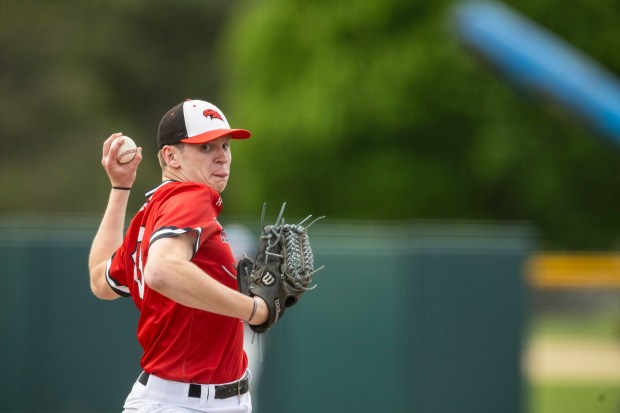 Marist's Frankie Bilecki delivers a pitch against Lincoln-Way East during a nonconference game in Chicago on Wednesday, May 8, 2024. (Vincent D. Johnson/for the Daily Southtown)