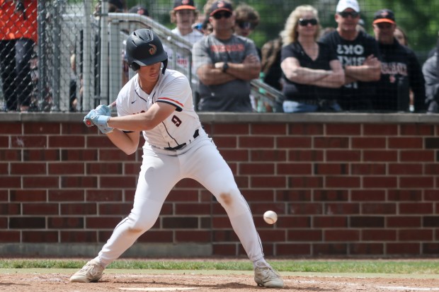 Lincoln-Way West's Anthony Massa (9) takes a pitch during the Class 4A Providence Sectional semifinal against Lincoln-Way Central in New Lenox on Wednesday, May 29, 2024. (Troy Stolt/for the Daily Southtown)