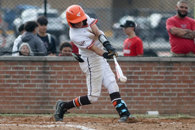 Shepard's Angel Villasenor (6) makes contact with the ball during the Class 4A Providence Regional quarterfinal game against Eisenhower in Palos Heights on Monday May 20, 2024. (Troy Stolt/for the Pioneer Press)