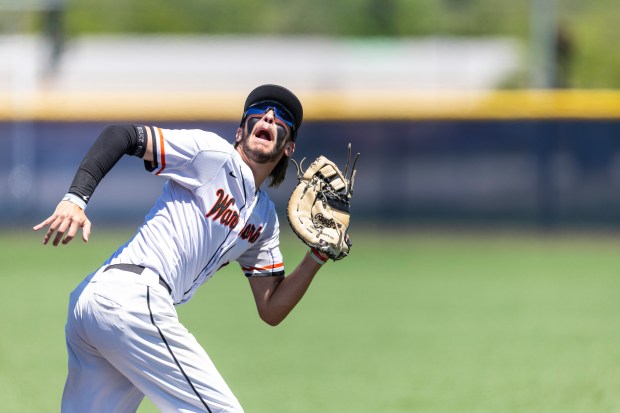 Lincoln-Way West's Jack Linko chases a ball into foul territory during the Class 4A Sandburg Regional final against Sandburg in Orland Park on Saturday, May 25, 2024. (Vincent D. Johnson/for the Daily Southtown)