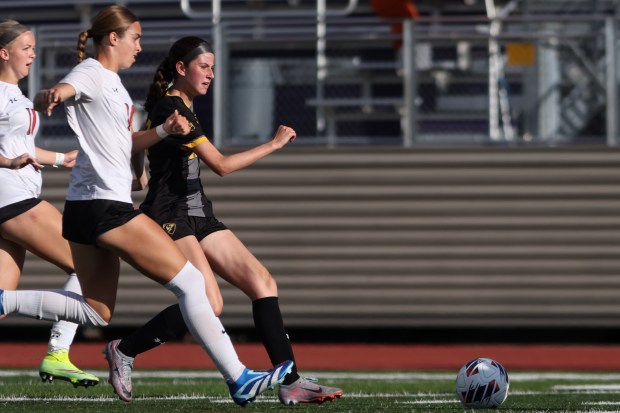 Andrew's Grace McGlynn (17) scores a goal during the Class 3A Bloomington Supersectional game against Edwardsville on Tuesday, May 28, 2024. (Troy Stolt/for the Daily Southtown)