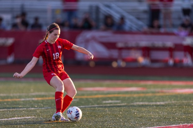 Homewood-Flossmoor's Ava Loudon send the ball into the net on the 5th penalty kick of overtime against Lincoln-Way West to win the Class 3A Homewood-Flossmoor Regional championship in Flossmoor on Friday, May 17, 2024. (Vincent D. Johnson/for the Daily Southtown)