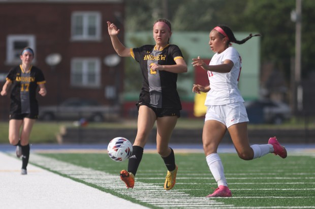 Andrew's Maxine Arvanetes (2) receives a pass during the Class 3A Joliet Central Sectional semifinal game against Homewood-Flossmoor in Joliet on Tuesday, May 21, 2024. (Troy Stolt/for the Pioneer Press)