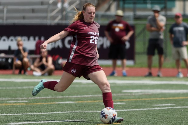 Lockport's Meghan Mack (26) scores a goal during a shootout against Lincoln-Way East in Lockport on Saturday May 4, 2024. (Troy Stolt/for the Daily Southtown)