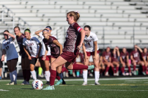 Lockport's Meghan Mack (26) scores on a penalty kick during the Class 3A Plainfield North Sectional semifinal game against Plainfield North in Plainfield on Wednesday, May 22, 2024. (Troy Stolt/for the Daily Southtown)