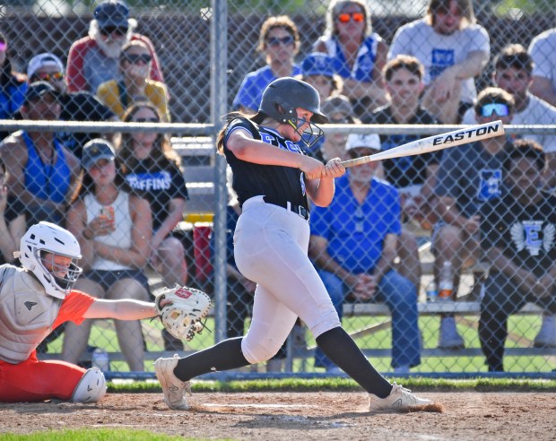 Lincoln-Way East's Cassidy Jagielski smashes a two run single to tie the game in the seventh inning against Lincoln-Way West during the Class 4A Lincoln-Way West Regional final on Thursday, May 23, 2024, in New Lenox.(Jon Cunningham for the Daily Southtown)