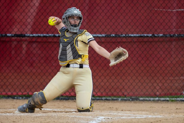 Oak Forest's Morgan Reczkiewicz throws back to the pitcher during a South Suburban crossover game against Eisenhower in Blue Island on Monday, May 20, 2024. (Vincent D. Johnson/for the Daily Southtown)