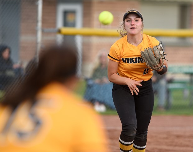 St. Laurence's third baseman Jordan Ogean (2) makes the throw to first against Providence during a Girls Catholic Athletic Conference game Tuesday, April 23, 2024 in Burbank, IL. (Steve Johnston/Daily Southtown)