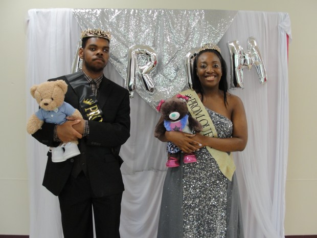 Kennedy School prom king Aaron B. and prom queen Jordan S. received stuffed animals and crowns from students at Andrew High School in Tinley Park, who helped out at Kennedy's recent dance. (St. Coletta's of Illinois)