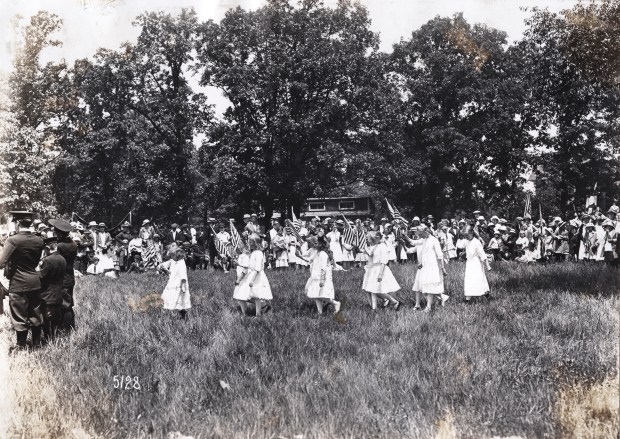 A group of girls conduct a flag drill during a June 1916, Cook County School Festival in Thornton. (Wisconsin Historical Society, WHI-76962)