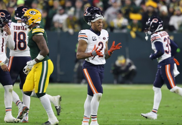 Bears wide receiver DJ Moore gestures in frustration after a failed third-down attempt against the Packers on Jan. 7, 2024, at Lambeau Field. (John J. Kim/Chicago Tribune)