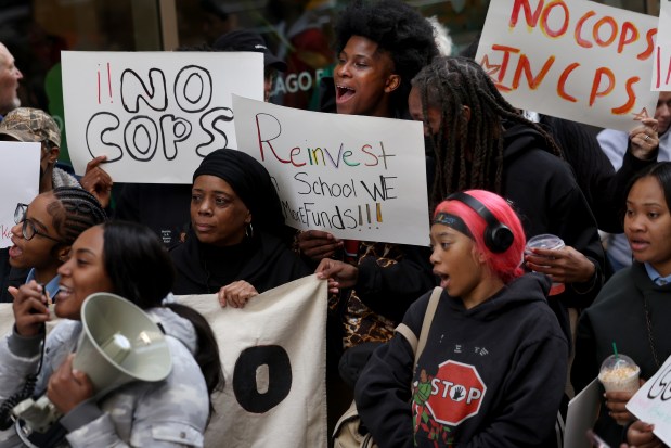 Dozens of Chicago Public School students, activists and supporters rally outside CPS headquarters on Feb. 22, 2024, before the Board of Education meeting to call on CPS to remove police and re-invest in schools and real safety for students and families. (Antonio Perez/ Chicago Tribune)